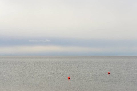 North Sea, red buoys in the Wadden Sea, Norddeich, Lower Saxony, Germany
