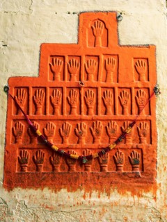 Sati stone hands mark the site of a woman's self-immolation at Mehrangarh or Meherangarh Fort,
