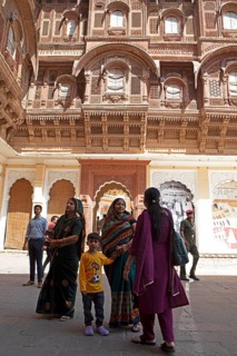 Indian woman in a courtyard of the Mehrangarh or Meherangarh fortress, Jodhpur, Rajasthan, India