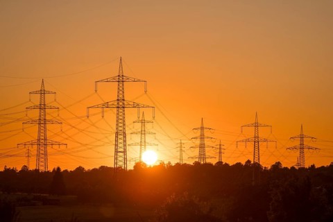 Clearly defined silhouettes of power lines in the golden light of sunset, Waiblingen,