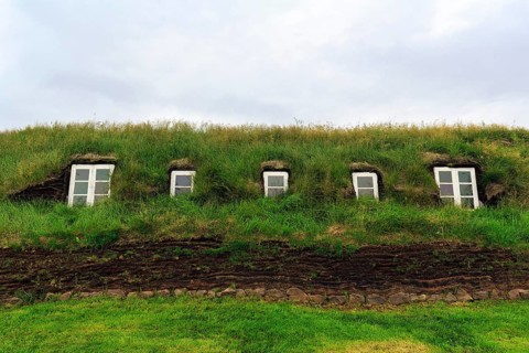 Grass sod house, window, green roof, peat farm or peat museum Glaumbaer or Glaumbær, open-air