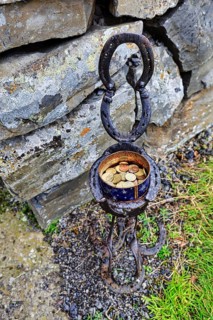 Tin with coins, donations for visiting a church, decorative stand, Vidimyrarkirkja peat church,