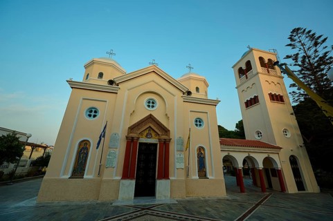 Church, Panagia Agia Paraskevi, Orthodox church with three towers and icons on the façade under a