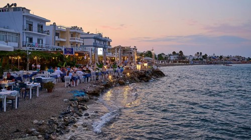 Restaurants at the Turkish ferry harbour, coastline with restaurants and relaxed atmosphere at