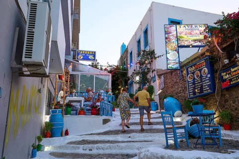 Riga Fereou, Steps of Kos, famous alley, picturesque alleyway with tavernas, colourful chairs and