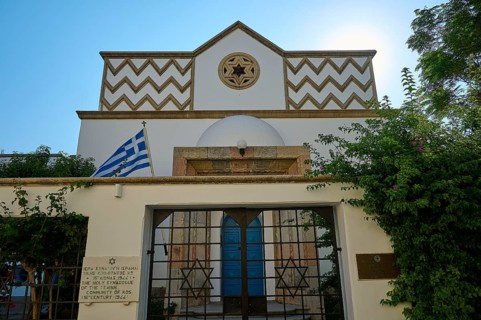 Entrance of a synagogue with decorative elements and Greek flag, Kos Town, Kos, Dodecanese, Greek