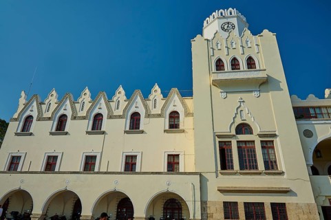 Palace of Justice, Colonial building, White building with clock tower and Gothic arches under a