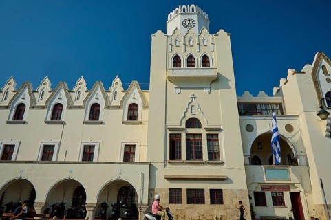 Palace of Justice, Colonial building, White building with clock tower and arches, framed by clear
