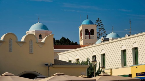 Church, Panagia Agia Paraskevi, domed buildings under a blue sky with traditional architectural