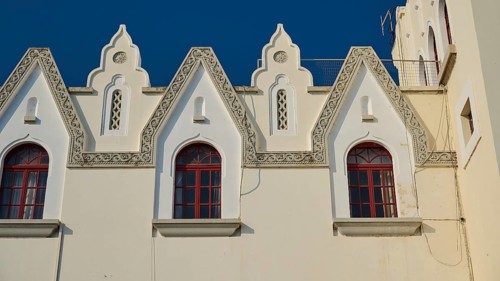 Palace of Justice, colonial building, close-up of a Gothic façade with windows and ornamental