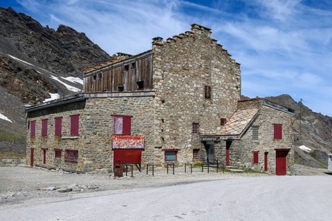 Building with restaurant and bar at the top of the highest asphalted Alpine pass, Col d'Iseran, Col