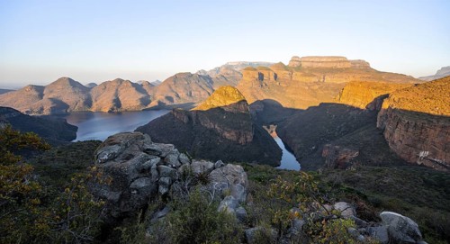 Sunset at Blyde River Canyon with Three Rondawels peak, view of canyon with Blyde River and table