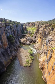 Canyon with steep orange-coloured cliffs with the Blyde River, Bourke's Luck Potholes, Panorama