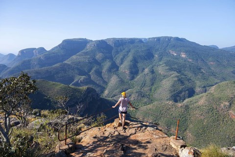 Tourist at the viewpoint, view of the Blyde River gorge, Lowveld Viewpoint, in the evening light,