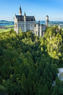 Neuschwanstein Castle by King Ludwig II above the Pöllat Gorge, fairytale castle in the