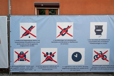 Board with prohibition notices depicted in pictograms, Erlanger Bergkirchweih, traditional