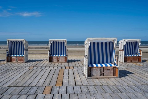Beach chairs on wooden planks, Sankt Peter Ording, Eiderstedt, North Frisia, North Sea,
