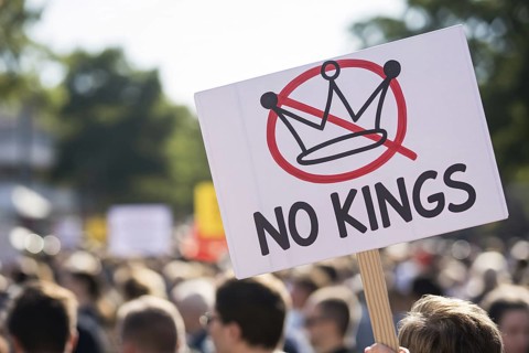 Protest sign with text No kings and crossed-out crown. Demonstration in progress. Generative AI, AI