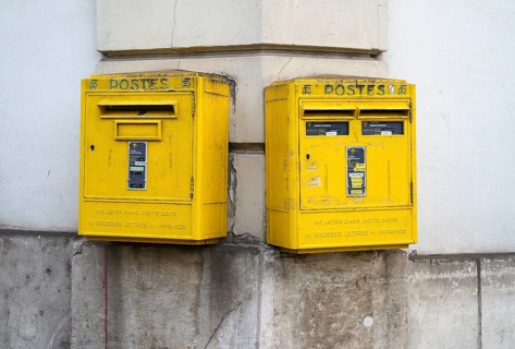 Two mailboxes, yellow, on the wall of a house, Épernay, Champagne, Marne, France