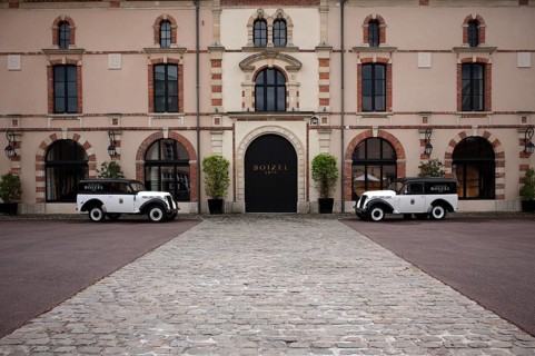 Black and white Renault Juvaquatre Editorial vintage cars in front of headquarters, head office,