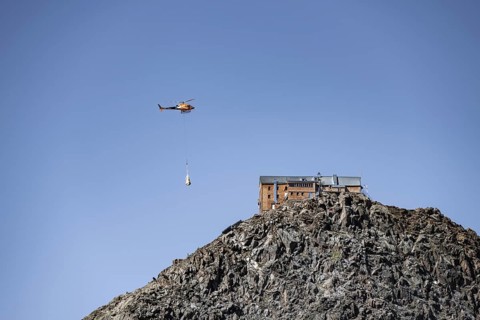 Becherhaus mountain hut on the summit of the Becher, helicopter to supply the mountain hut, Stubai