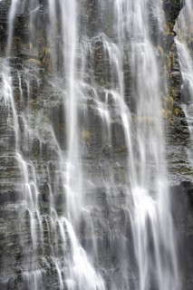 Water flowing down rocks, detail of a waterfall, Lisbon Falls, long exposure, near Graskop,