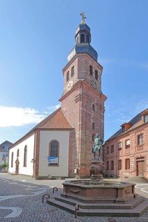 Baroque Luther Church built in 1758 and cobbler's fountain, sculpture, cobbler, symbol of former