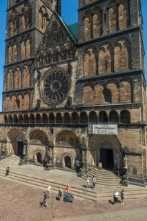 Gothic west façade of St Peter's Cathedral on the market square, double tower from 1896, rose
