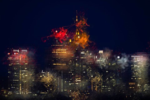 The lights of Frankfurt's banking skyline glow in the night. (long exposure), Frankfurt, Hesse,