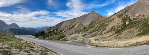 Northern ascent mountain road alpine road with serpentines above tree line shortly in front of pass