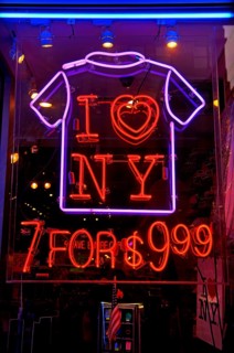 Illuminated advertising for T-shirts, New York City, USA