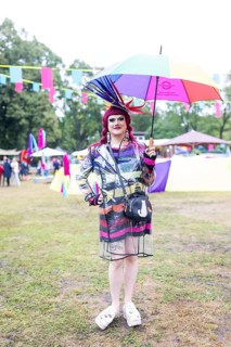 Artist with colourful umbrella at Kidzapalooza at the Lollapalooza Festival in the Olympiastadion