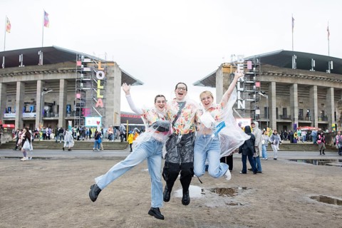 Festival visitors in front of the Olympic Stadium at the Lollapalooza Festival in the Olympic