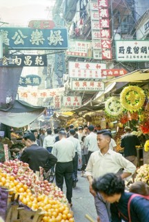 Captioned as 'Chinese fruit and flower stalls', Victoria, Hong Kong, Asia 1964