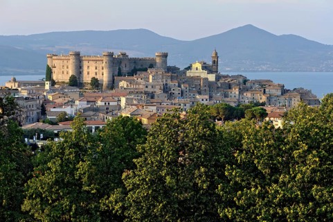 Castello Odescalchi fortress, Duomo Santo Stefano cathedral, behind Lake Bracciano, Lago di