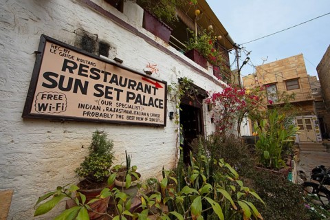 Signpost to the restaurant in the old town of Jaisalmer, Rajasthan, India