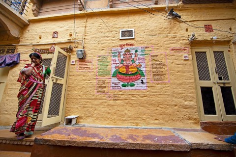 Colourful Ganesha picture on a house wall in the fortress of Jaisalmer, Rajasthan, India