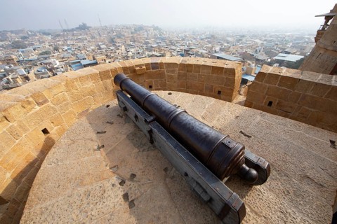 Cannon in the fortress of Jaisalmer, back view of the city, Rajasthan, India