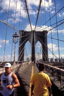Jogger on the Brooklyn Bridge, New York City, USA