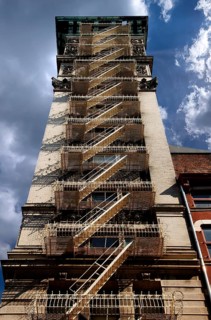 Residential tower with fire escape Downtown, New York City, USA