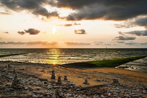 Sunset over beach of WHALE LIGHTHOUSE, Saint-Clement-des-Baleines, Atlantic, France