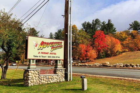 Sign with lettering, fall leaves, boutique hotel, theme hotel Adventure Suites Hotel, Indian