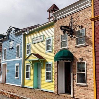 Replica, historic town hall, elementary school, library, colorful facades, signs with inscription,