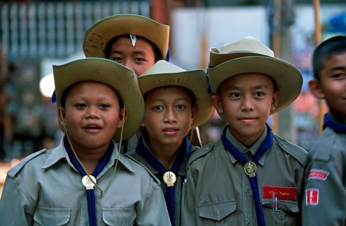 Young scouts at Damnoen Saduak floating market, Thailand, December 2002, vintage, retro, old,
