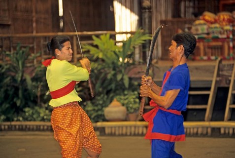 Performance of a traditional sword fight in the Rose Garden near Bangkok, Thailand, December 2002,