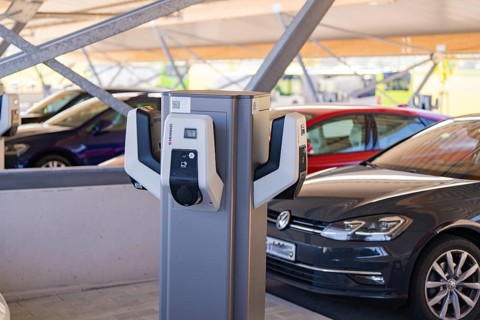 Electric cars at a charging station in a modern parking garage, e-charging park, Merklingen,