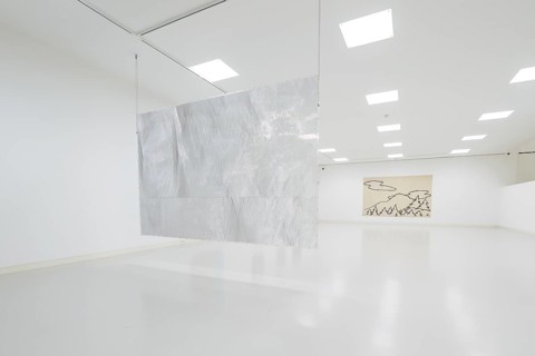 A metal work of art hangs in a minimalistic exhibition space, Schauwerk, Sindelfingen, Germany