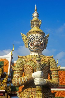 Temple guard, Yaksa Tavarnbal, at one of the entrances to Wat Phra Kaeo, Bangkok, Thailand,