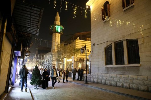 In Damascus, Syria, on December 25, 2025, festive scenes filled the streets and churches of the Bab