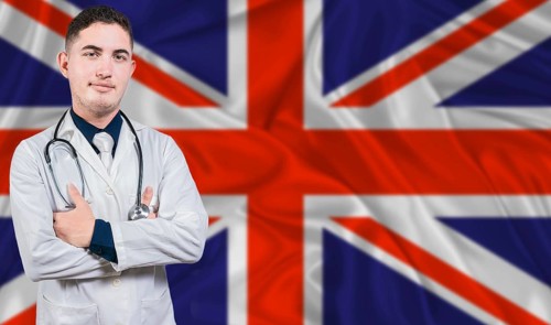 Portrait of medical professional on United Kingdom flag background. British national health system